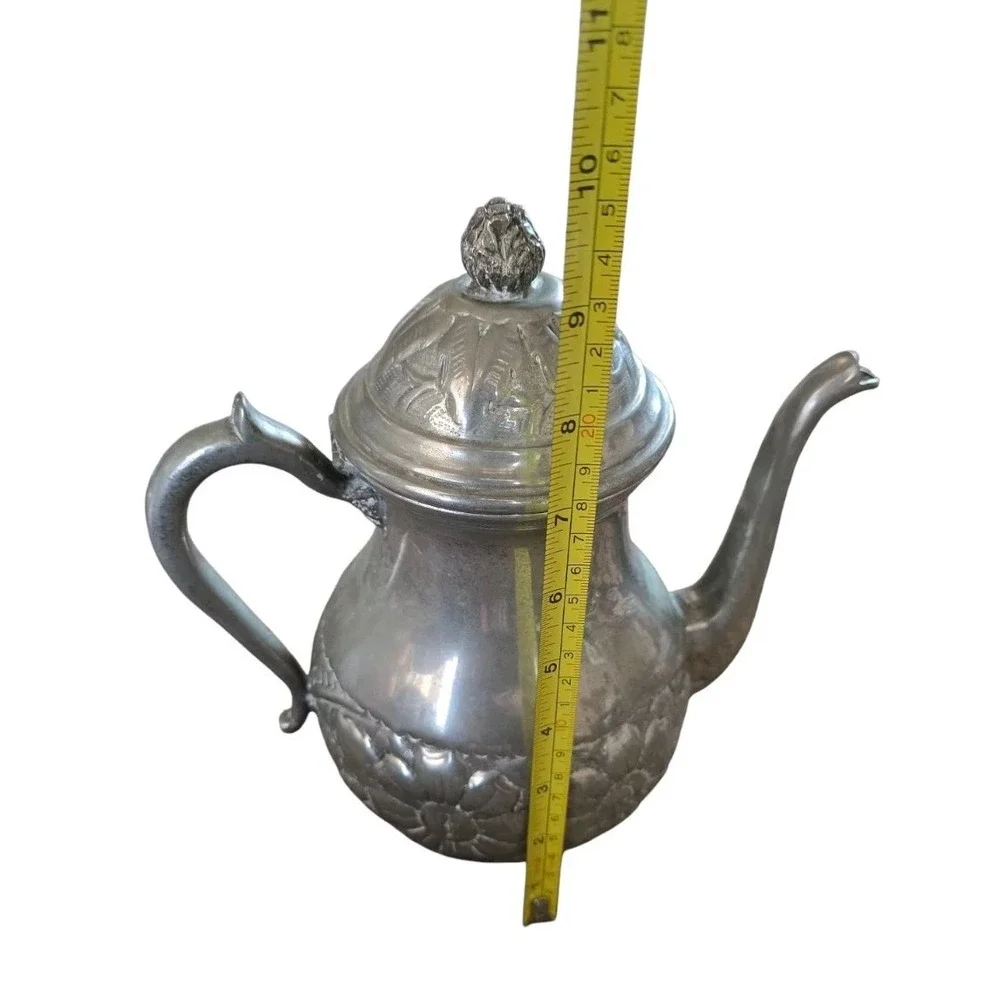 Vintage silver‎ plated teapot with hinged lid and floral engraving